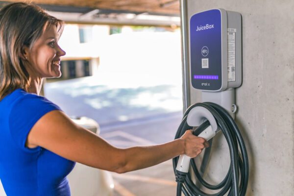 Lady with Juicebox EV Charger